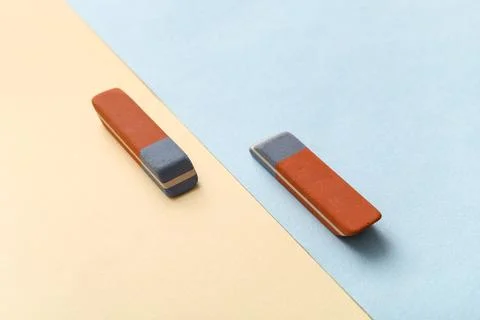 School erasers on color background Stock Photos