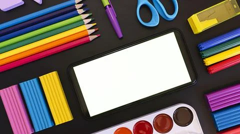 School flatley on the topic back to school, school supplies on a chalk board Stock Photos