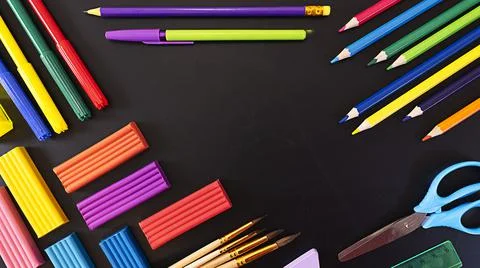 School flatley on the topic back to school, school supplies on chalk board with Stock Photos