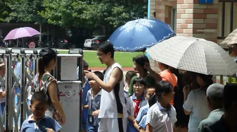 School gate, transfer students parents Stock Footage 67312722