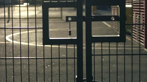 School gates with playground at dusk Stock Footage 337121405