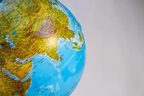 School globe on a white background. Stock Photos