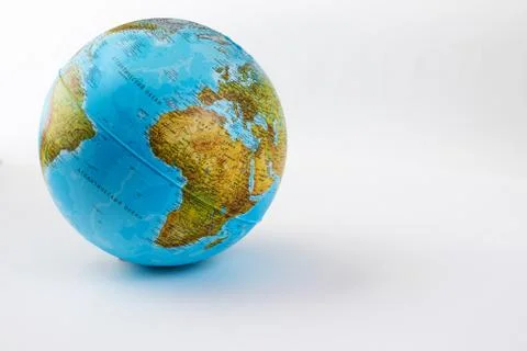 School globe on a white background. Stock Photos
