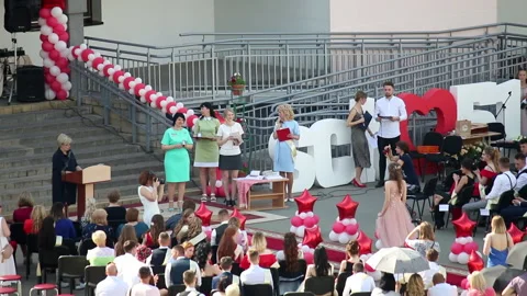 School Graduation Celebration. Presentation of certificates to graduates and  Stock Footage 132414176