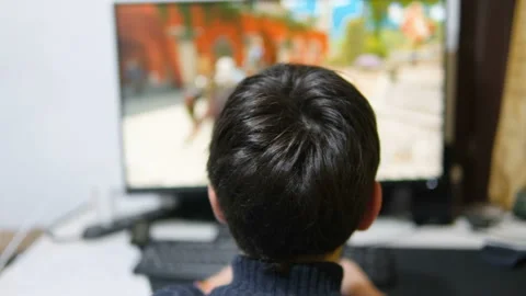 School guy play competitive game at home,computer videogames tech addiction 4K Video stock 232129221