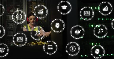 In school, image of technician working on server with digital technology icons Stock Photos