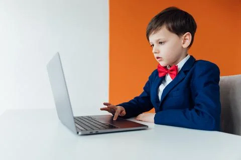 School IT programming boy at the computer in the classroom learning online Foto stock