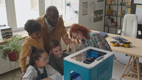 School Kids Looking at 3D Printer on Computer Class Stock Footage 245453658