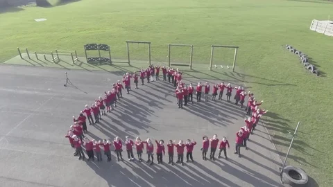 School Kids Make Heart Shape 12 Seconds Stock Footage 72642922