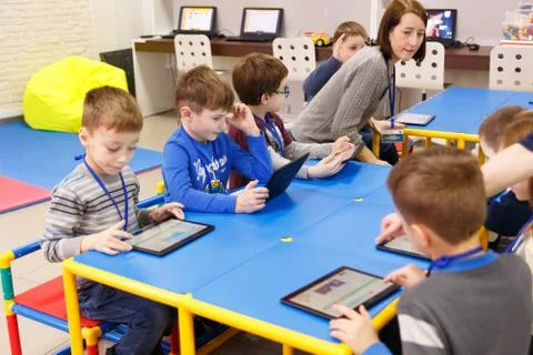 School kids using digital tablet Fotos Stock