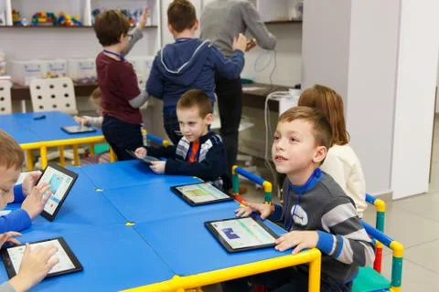 School kids using digital tablet Fotos Stock