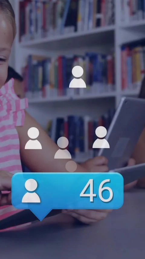 In school library, children using tablets and laptops with animation overlay Stock Footage 344403977