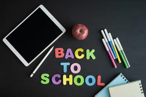 School materials with the phrase BACK TO SCHOOL. Copy space. Stock Photos