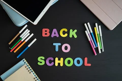 School materials with the phrase BACK TO SCHOOL. Stock Photos