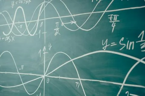 School math lesson. Trigonometry. Chalkboard Function graphs. Stock Photos