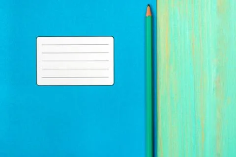 School notebook and pencil on table Stock Photos