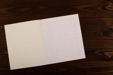 School notebook with lines on the table. School supplies. Top view. Copy space Stock Photos