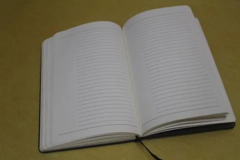 School notebook on a white background, notepad on a table Stock Photos