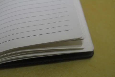 School notebook on a white background, notepad on a table Stock Photos