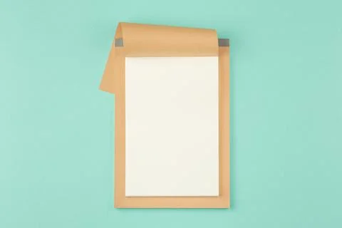 School notepad on cyan background. Foto stock