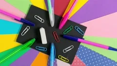 School supplies on pink board background, Stock Video