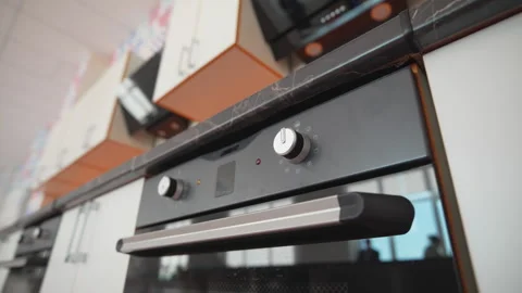 School oven with control knobs and reflective panel Stock-Footage 309774934
