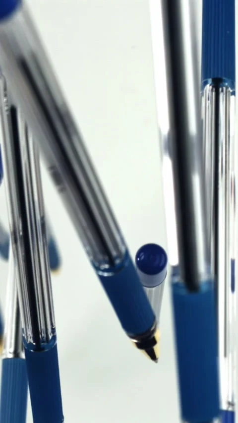 School pens fly up and down. Filmed on a high-speed camera at 1000 fps Stock Footage 335371953