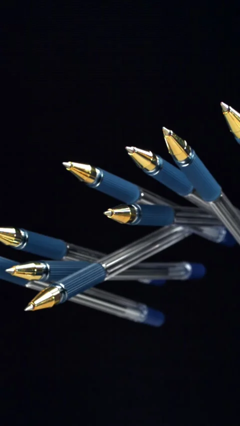 School pens fly up and down. Filmed on a high-speed camera at 1000 fps Stock Footage 335378349