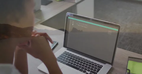 In school, person coding on laptop, contemplating programming task with Stock Footage 304645244