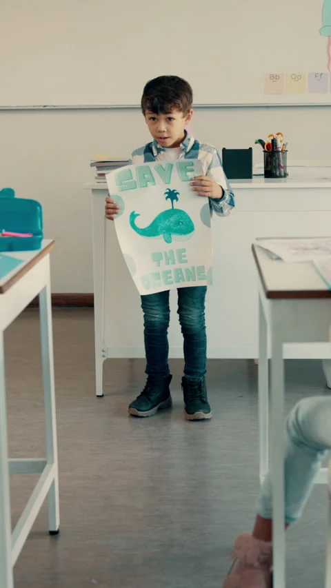 School, presentation and boy in classroom with poster for conservation, climate Stock Footage 332920045