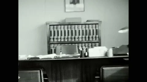 School principal in black and white 50s office Stock Footage
