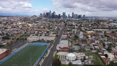 School Stadium to Downtown LA Stock Footage 133397286