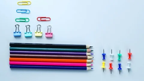 School Stationary Flat Lay on White Background Timelapse 4K Stock Footage 93623842