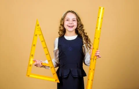 School student learning geometry. small girl back to school. STEM school 写真素材