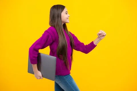 School student using laptop. E-learning and online education. Teen girl on Stock Photos