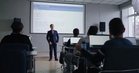 School Students Discussing Computer Science Project Of Classmate In Programming Stock Footage 280178282