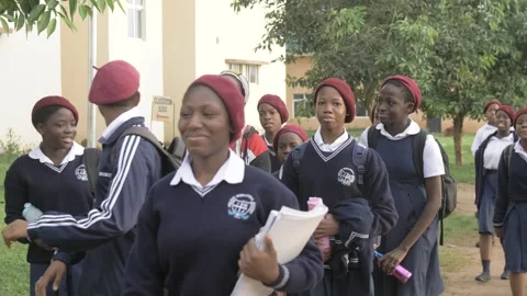 School students learning ,writing and listening to teacher in the classroom Stock Footage 250801398