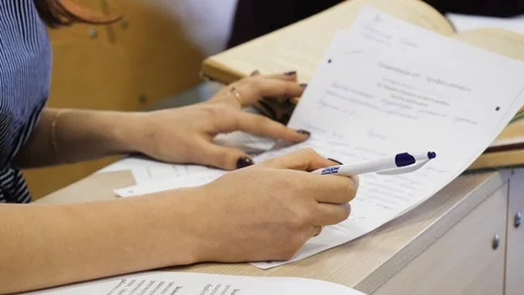 School student's taking exam writing answer in classroom for education and Video stock 85863893