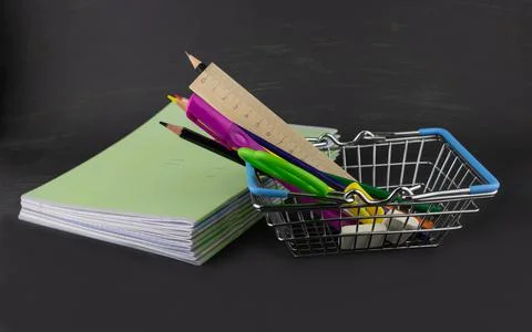 School supplies and a stack of notebooks Stock Photos