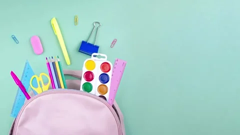 School supplies are collected in a backpack. Back to school concept. Stock Footage 282429848