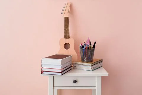 School supplies on bedside table Stock Photos