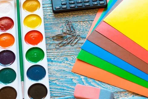 School supplies on a blue background Stock Photos