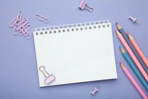 School supplies concept. Open notebook with colorful pencil. Space for text Stock Photos