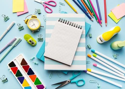 School supplies flat lay preparing for education and creativity Stock Photos