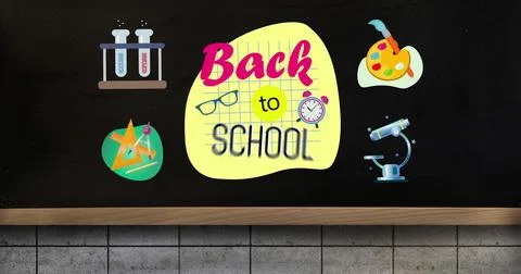 School supplies including scissors, clock, and a microscope are on display Stock Photos