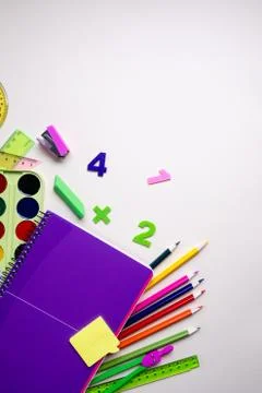 School supplies on light background. Top view. Copy space. Stock Photos