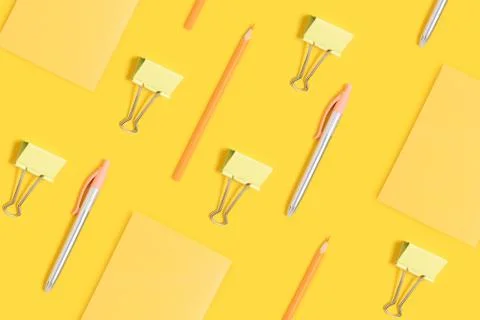 School supplies pattern on a yellow background. Stock Photos