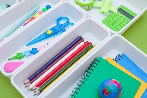 School supplies.Concept back to school. colored stationery is arranged in white Stock Photos