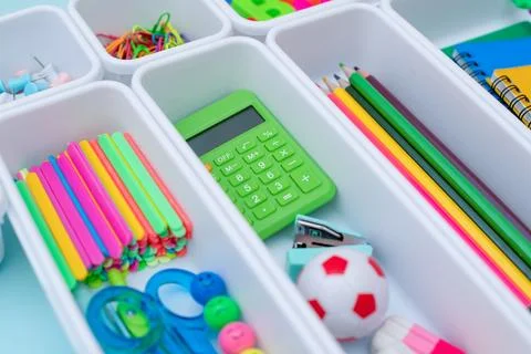 School supplies.Concept back to school. colored stationery is arranged in white Stock Photos