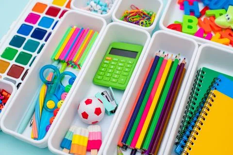 School supplies.Concept back to school. colored stationery is arranged in white Stock Photos